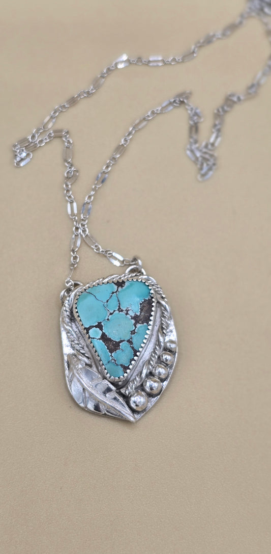 Turquoise and feather